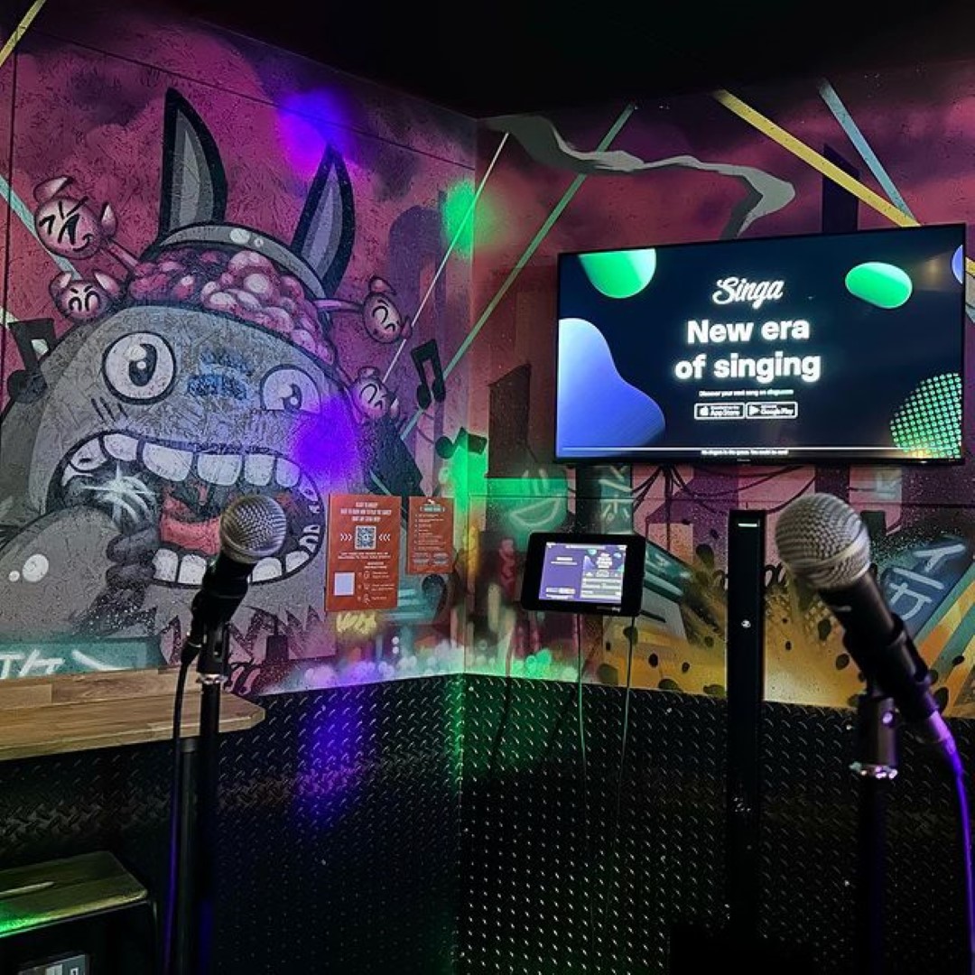 Grafiti on the walls of a karaoke room at the Roxy Ball Room in Leicester