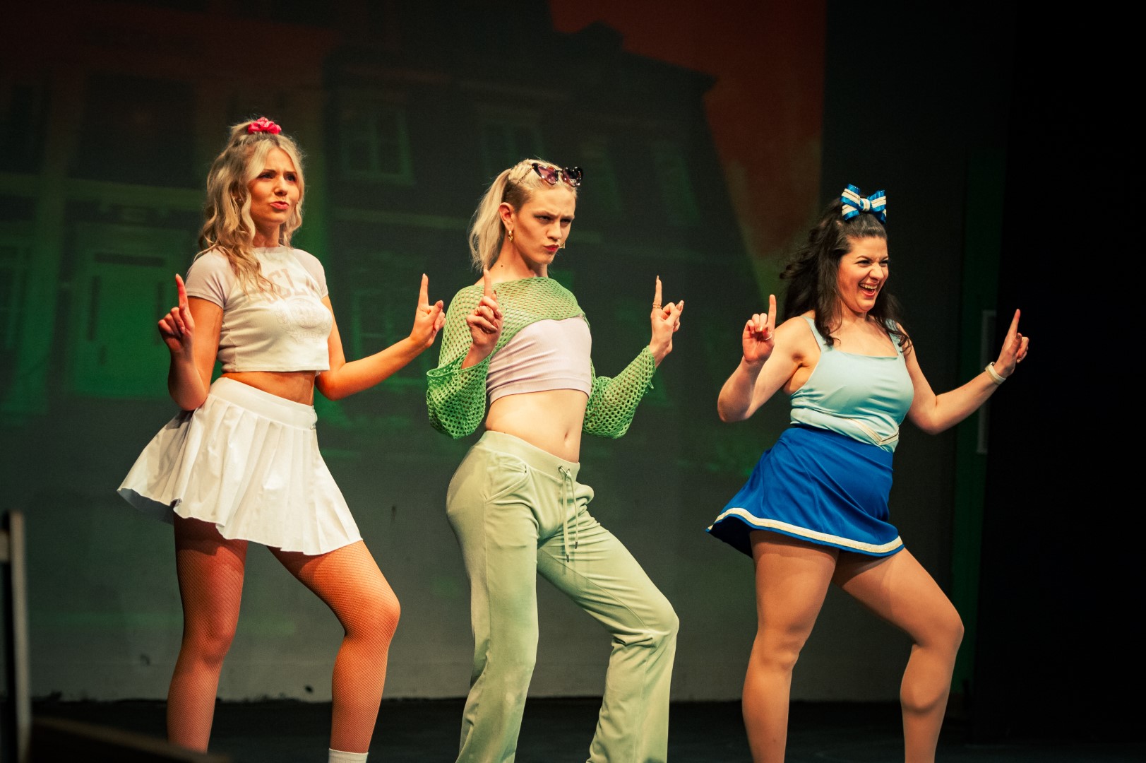 Pilar (Niall Johnson), Margot (Charlotte Brown), and Serena (Rachel Wheeler) serve as Elle's Greek chorus. Photography by Poyner + Mee.